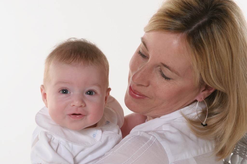 Mom Smiling At Baby