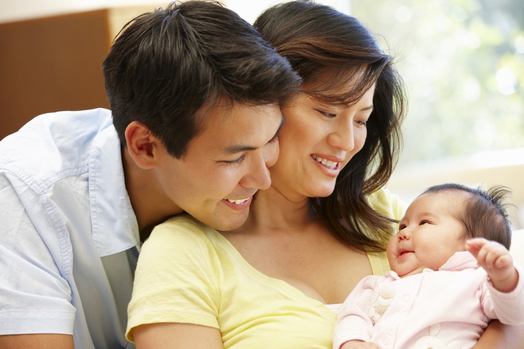 Asian couple and baby